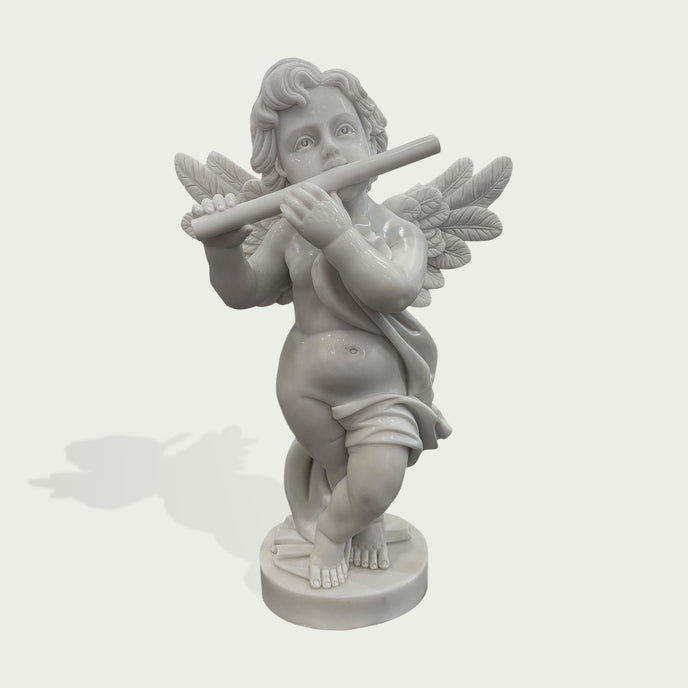 Natural white marble cherub angel flute statue with detailed wings, curled hair, and flowing drapery on a clean product background.