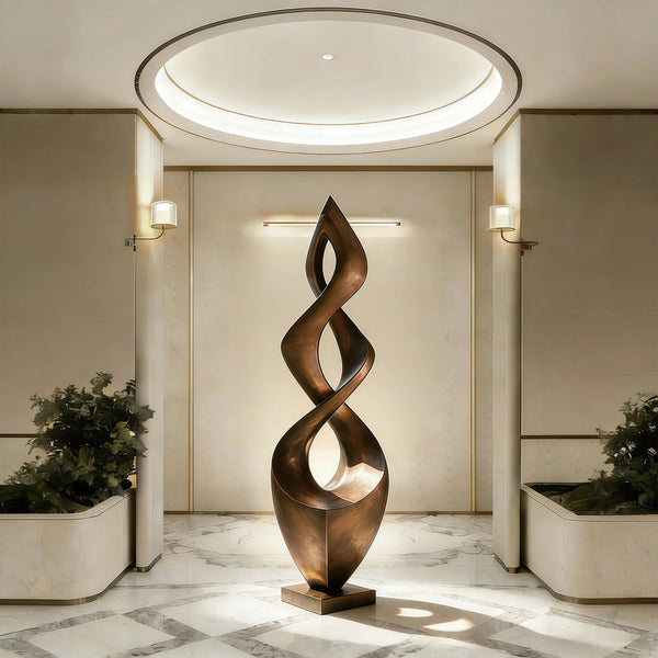 Bronze Infinite Helix spiral abstract sculpture in a modern interior setting with marble floor and wall lights.
