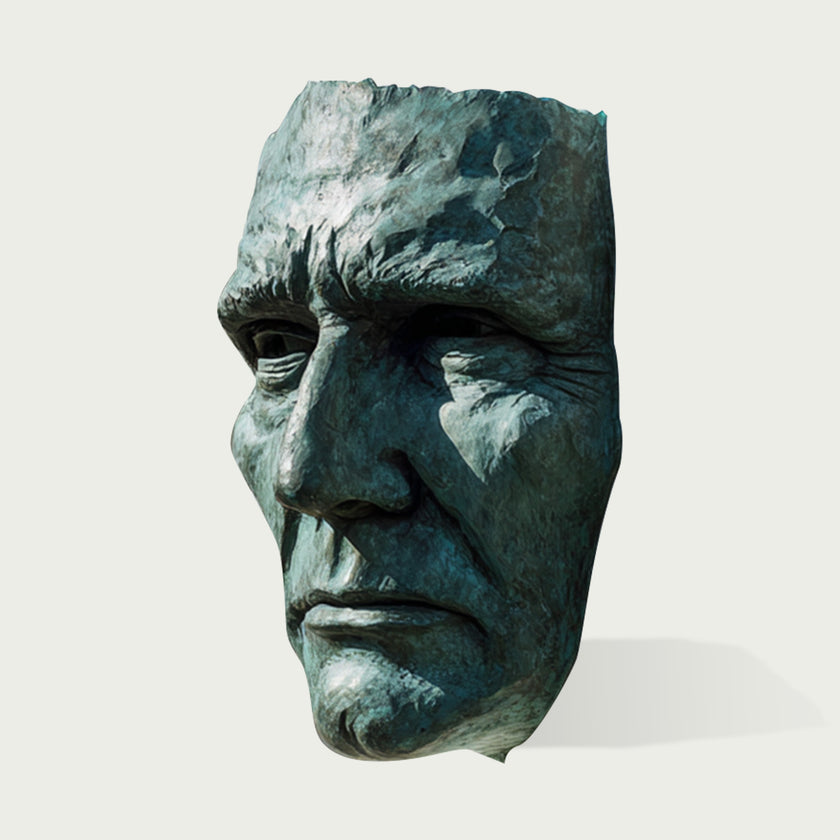 Dramatic Male Wall Art Bronze Sculpture of a face on a white background