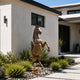 Rearing Steed Bronze Horse Statue Large Garden Statues in front of a luxury villa entrance