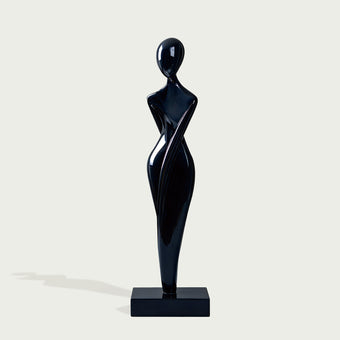 Graceful Female Silhouette Glossy Black Bronze Sculpture standing on a rectangular black base against a light gray background.