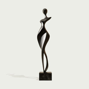 Rhythmic Walking Woman Abstract Bronze Figure Sculpture of a stylized female figure standing on a rectangular black marble base, set against a light gray background.