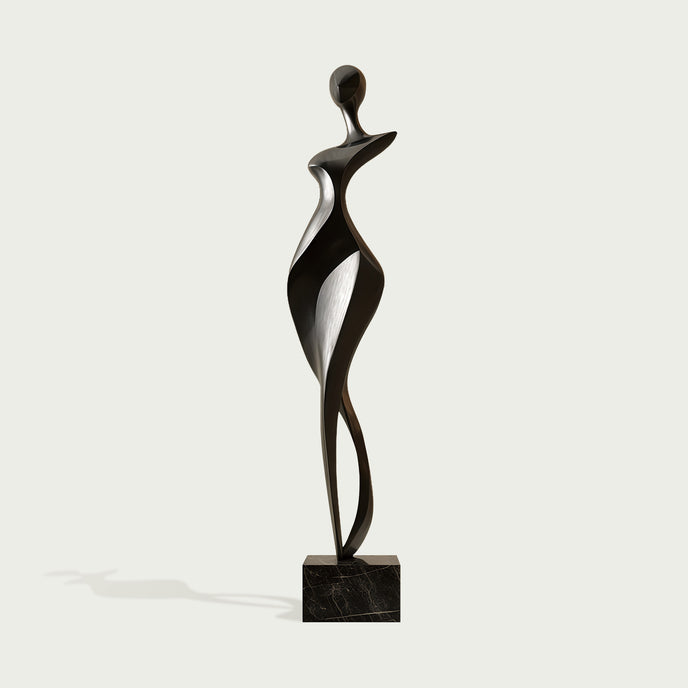 Rhythmic Walking Woman Abstract Bronze Figure Sculpture of a stylized female figure standing on a rectangular black marble base, set against a light gray background.