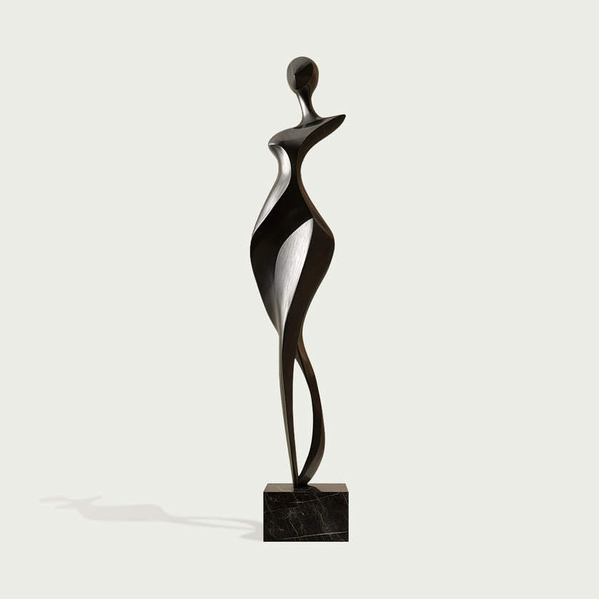 Rhythmic Walking Woman Abstract Bronze Figure Sculpture of a stylized female figure standing on a rectangular black marble base, set against a light gray background.