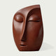 Serene Meditative Face Abstract Bronze Sculpture with closed eyes, photographed against a light gray background.