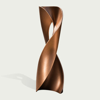 Twisted Hourglass Abstract Contemporary Bronze Sculpture featuring a twisted, spiral form in a metallic copper or bronze finish, set against a solid light gray background.