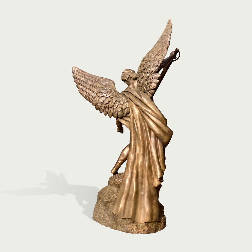 Holy Defender Classical Archangel St. Michael Bronze Sculpture with outstretched wings, draped robes, and a base, shown on a plain light gray background.