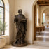 St. Luke The Evangelist Bronze Statue Outdoor Sculpture in the corner of a church