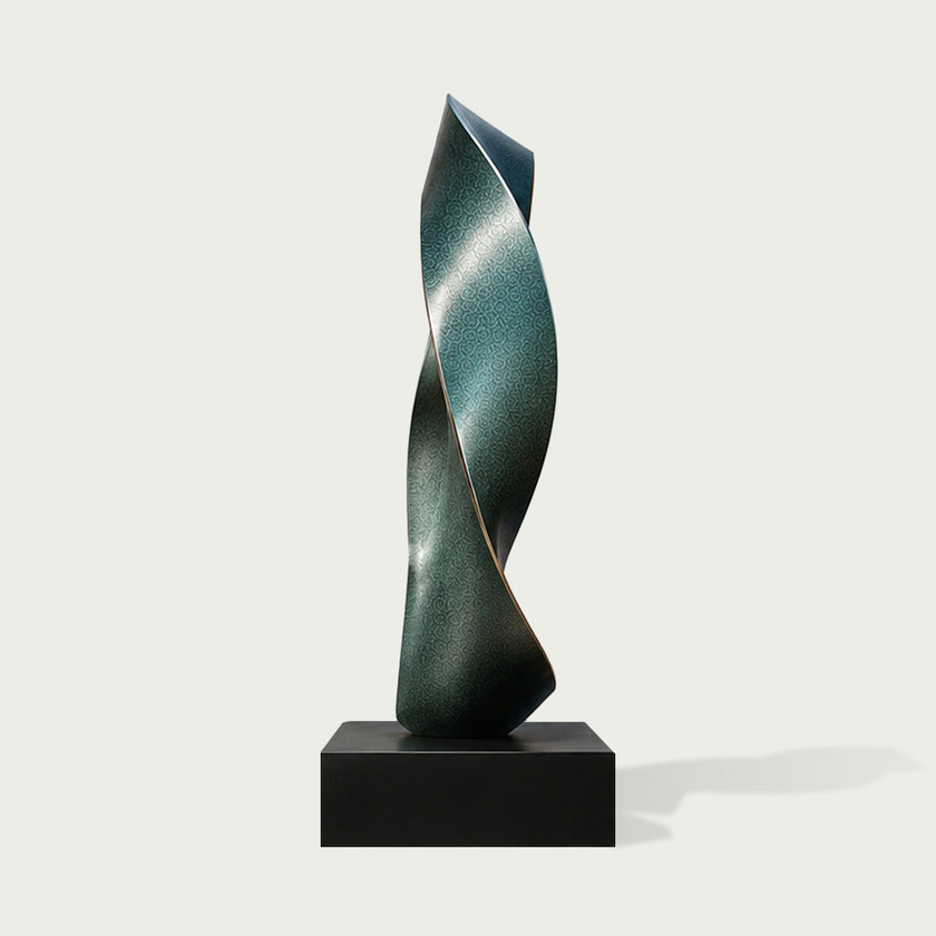 Twisted Emerald Ribbon Abstract Art Sculptures Modern Contemporary Sculpture in a dark metallic teal-green finish, mounted on a rectangular black pedestal against a light gray background.