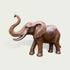 Lucky Raised Trunk Elephant Bronze Sculpture Large Outdoor Statues with a polished bronze finish, featuring detailed textures on its trunk, ears, and legs, set against a solid light gray background.