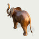 Lucky Raised Trunk Elephant Bronze Sculpture Large Outdoor Statues with a polished bronze finish, shown from a three-quarters rear angle against a light gray background.