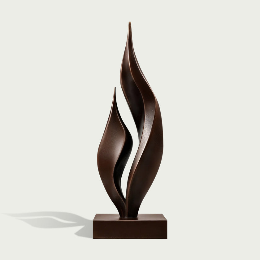 Dancing Twin Flames Bronze Art Sculpture with three flowing, flame-like vertical forms rising from a rectangular base, shown on a clean off-white background.