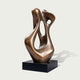 Modern abstract bronze sculpture featuring smooth organic curves, asymmetrical open spaces, a warm brown metallic surface, and a rectangular black display base.