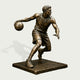 Detailed bronze basketball player statue capturing an athlete mid-dribble with one hand controlling the ball, a defensive arm extended, and legs in motion, finished with realistic uniform folds, shoes, and defined musculature.