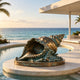 Large bronze conch shell sculpture displayed beside an oceanfront swimming pool, featuring a dramatic flared opening, spiral shell ridges, curling wave details, and turquoise verdigris accents over a warm antique bronze surface.