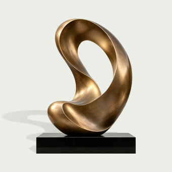 Contemporary abstract bronze sculpture with a sweeping looped form, smooth flowing curves, open central space, warm brushed gold bronze finish, and polished black rectangular base.
