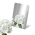 Stainless Steel Color Sample Mirror Polished Silver with a reflection of white flower on a white background.