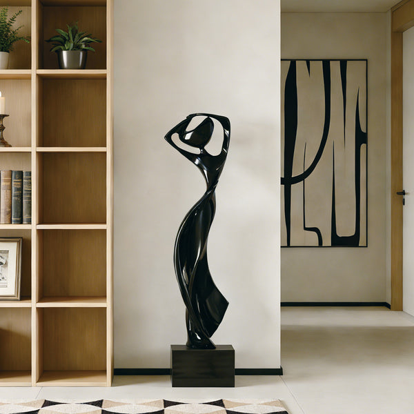 Elegant Woman Fiberglass Sculpture With Raised Arms in a room with wooden bookshelf and decorative elements