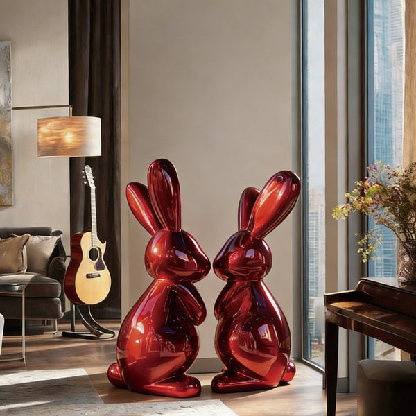 Striking Metallic Red Fiberglass Rabbit Sculpture in a modern living room.