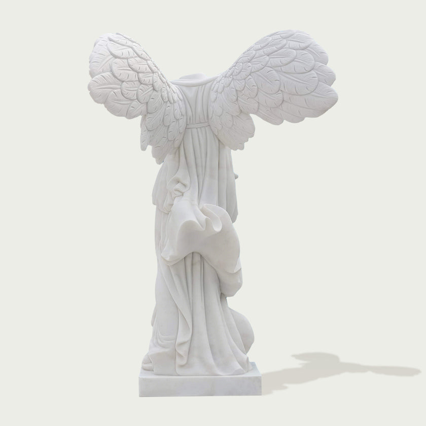 Classic Greek Winged Victory Of Samothrace Marble Statue Replica on a white background