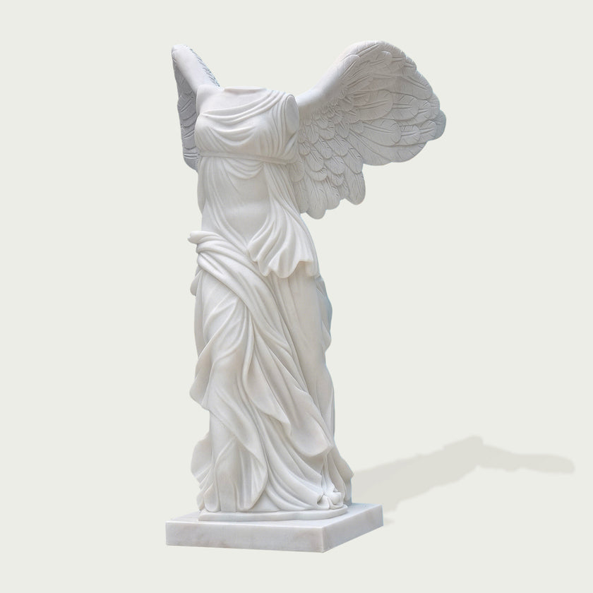 Classic Greek Winged Victory Of Samothrace Marble Statue Replica on a white background