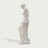 Venus de milo greek goddess sculpture replica on a light gray background