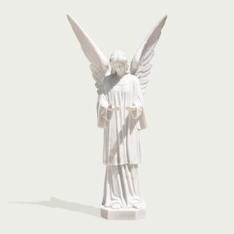 Large cathedral angel statue on a white background