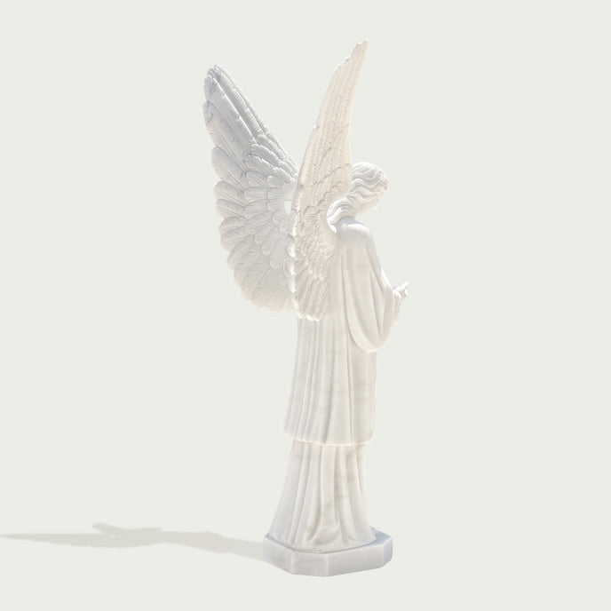 Large cathedral angel statue on a white background
