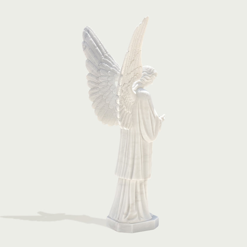 Large cathedral angel statue on a white background