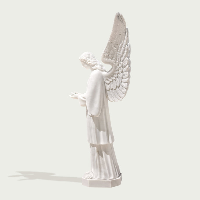 Large cathedral angel statue on a white background