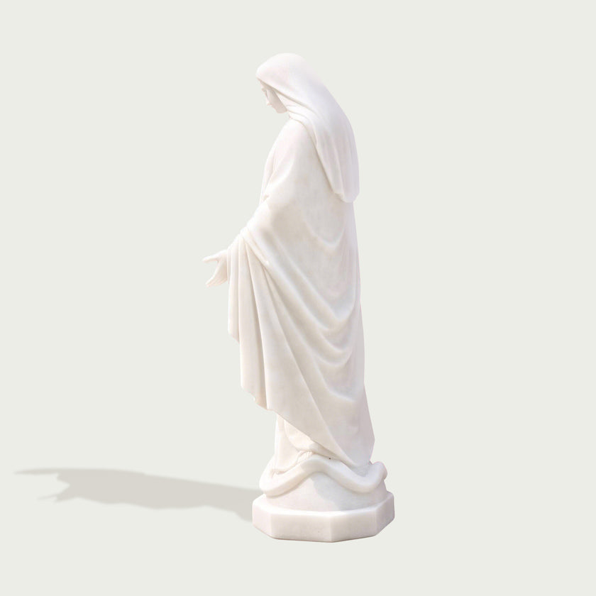 Our Lady Of Grace Virgin Mary Marble Statue on a white background