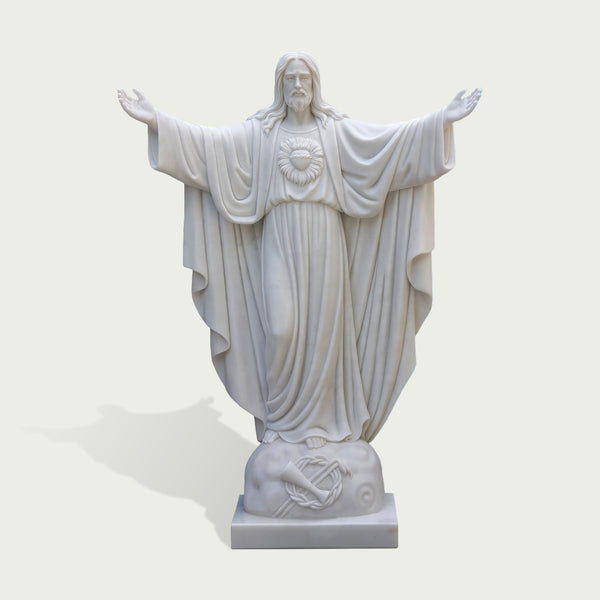 Serene Marble Sacred Heart Jesus Statue on a white background