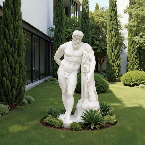 Classic farnese hercules marble statue replica in a garden setting with greenery and a modern building.