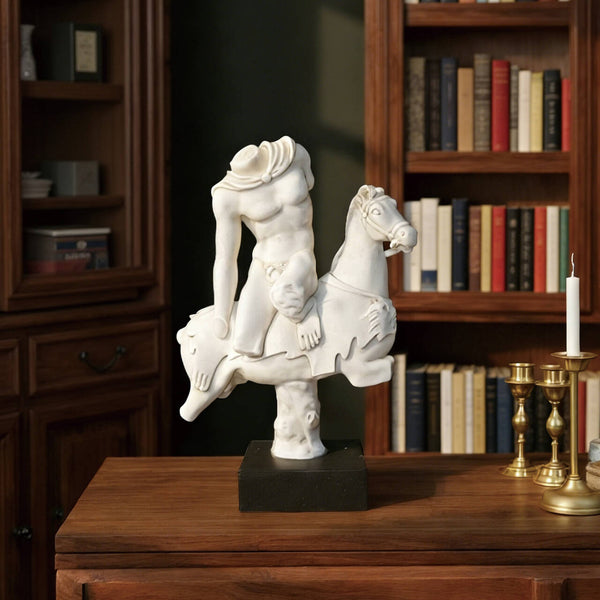 Fragmented Classical Male Equestrian Marble Statue on a wooden table with bookshelves in the background
