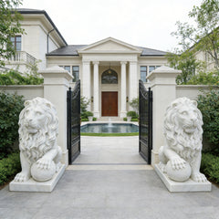 Classic Sitting Guardian Lion Marble Statue flanking a grand entrance with a mansion in the background