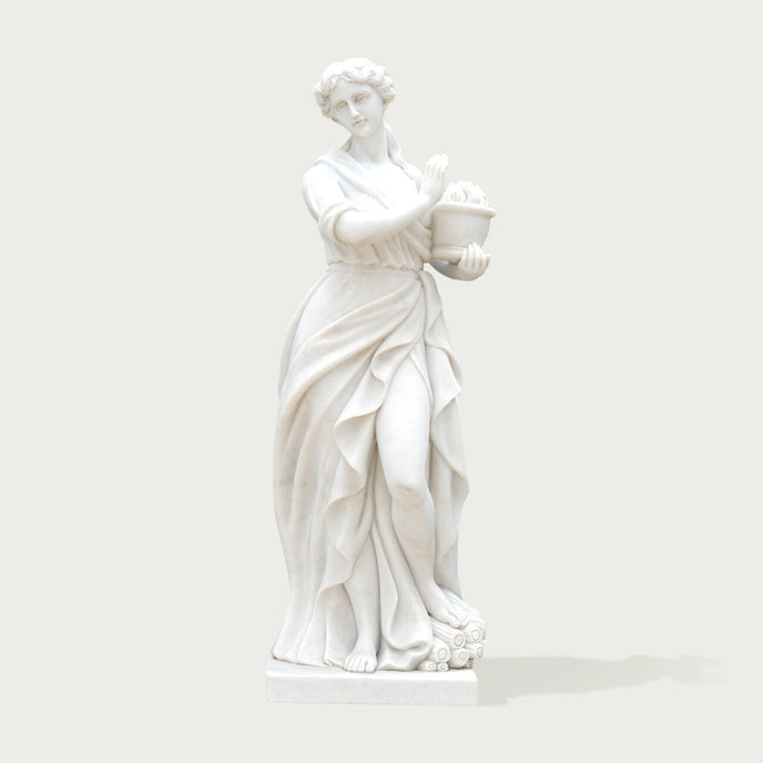 Classic Four Seasons Flora Marble Statue With Flower Basket on a white background.