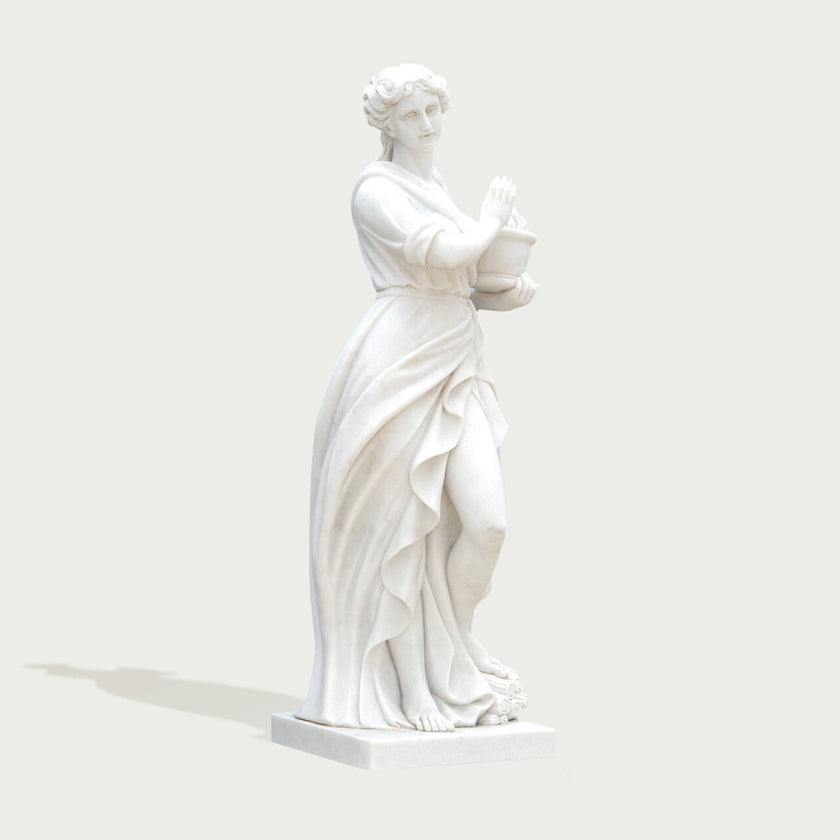 Classic Four Seasons Flora Marble Statue With Flower Basket on a white background.