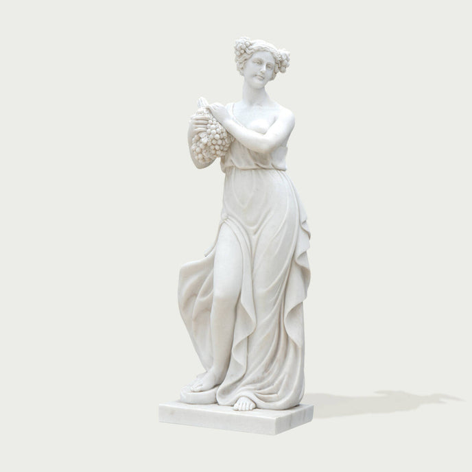 Elegant Autumnal Harvest Marble Statue With Grapes on a white background