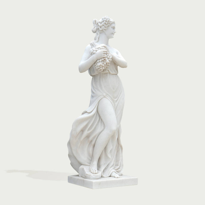 Elegant Autumnal Harvest Marble Statue With Grapes on a white background