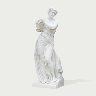 Classic Four Seasons Flora Marble Statue With Flower Basket on a white background.