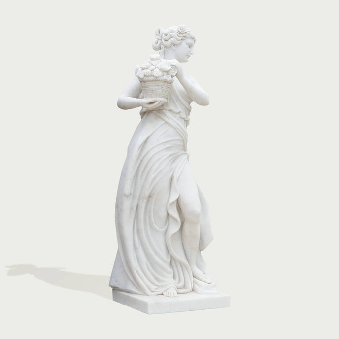 Classic Four Seasons Flora Marble Statue With Flower Basket on a white background.