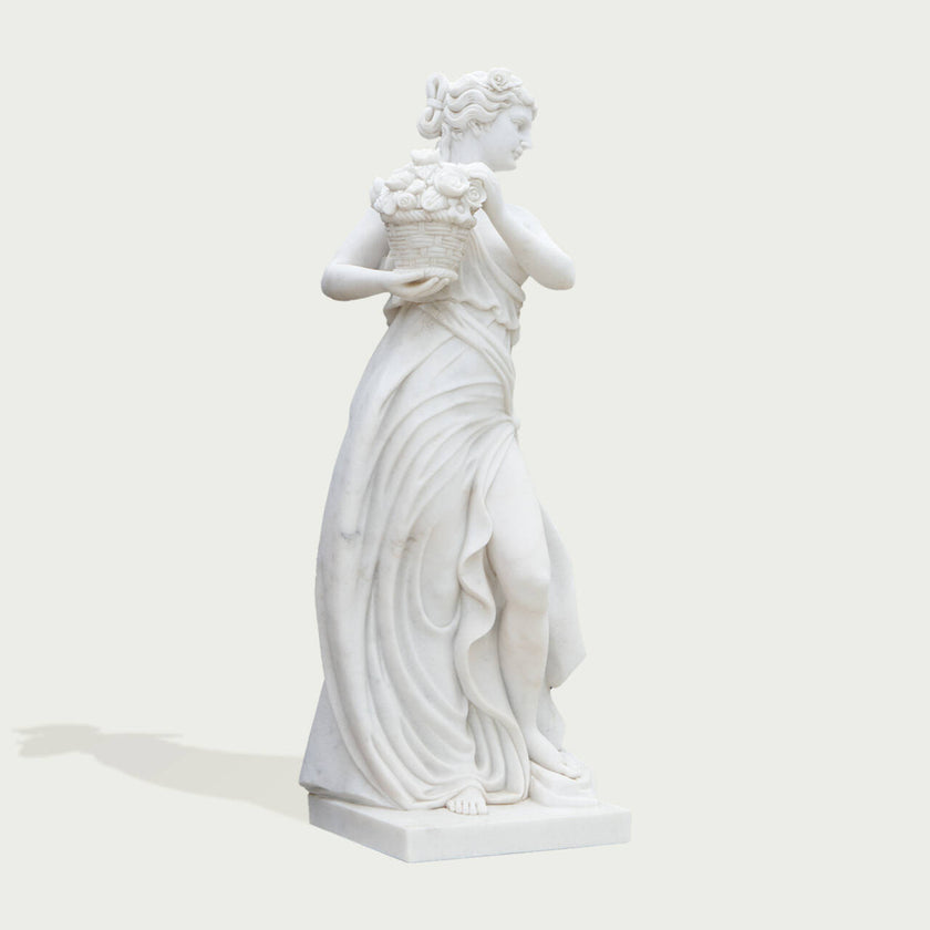 Classic Four Seasons Flora Marble Statue With Flower Basket on a white background.