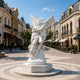 Mythological Love Cupid and Psyche Marble Statue in a European-style street with buildings and clear sky