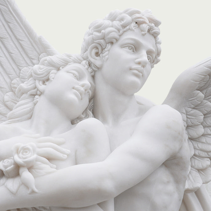 Mythological Love Cupid and Psyche Marble Statue set against a white background