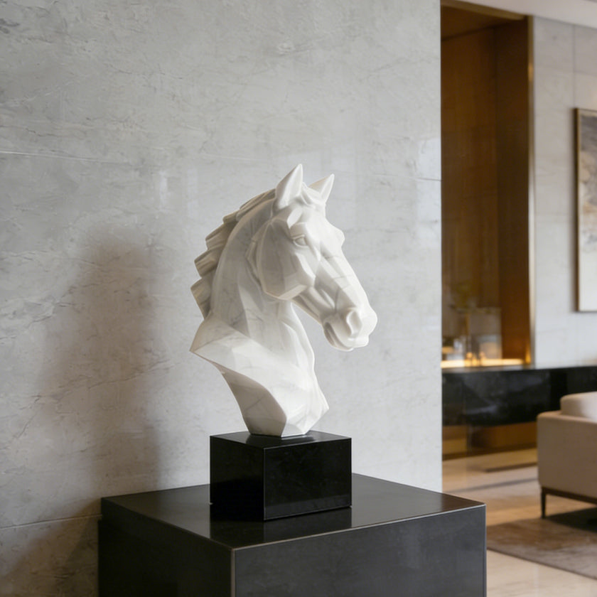 Modern Geometric Natural White Marble Horse Head Sculpture on a black pedestal against a gray wall.