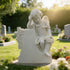 Sleeping Angel Natural White Marble Cherub Memorial Headstone on a grave in a cemetery