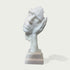 Fragmented Face Marble Sculpture on a white background