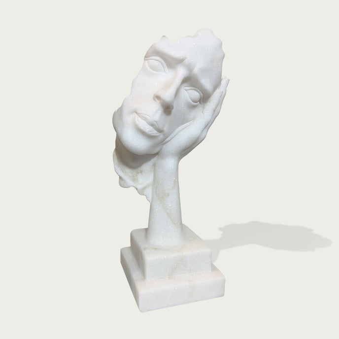Fragmented Face Marble Sculpture  on a white background