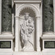 Virgin Mary And Child Marble Statue Outdoor Sculpture in an architectural setting with columns and decorative archway.