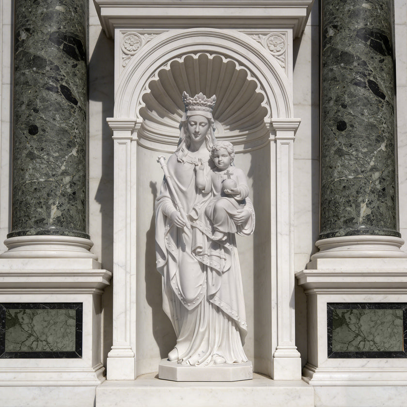 Virgin Mary And Child Marble Statue Outdoor Sculpture in an architectural setting with columns and decorative archway.